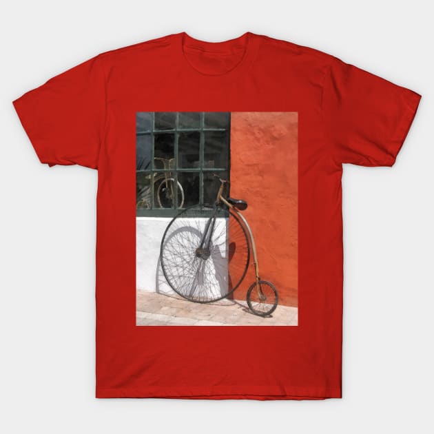 Bicycles - Penny-Farthing in Front of Bike Shop T-Shirt by SusanSavad